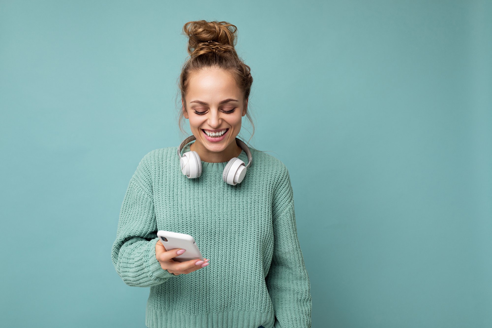 Woman with mobile phone on a blue background